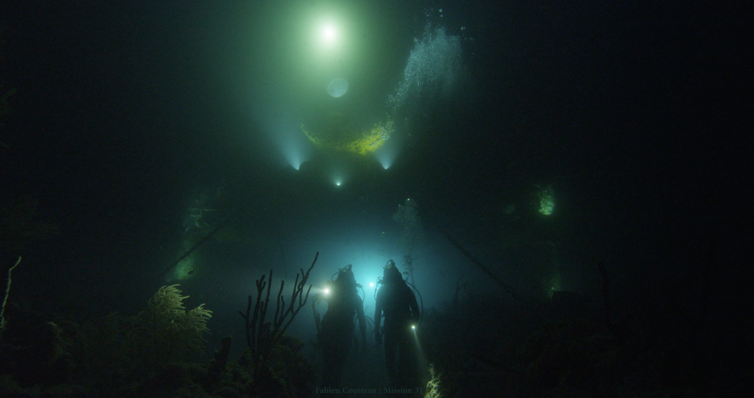 Ocean explorer Fabien Cousteau leads Mission 31 team on a night exploration dive out of Aquarius underwater lab off the Florida Keys