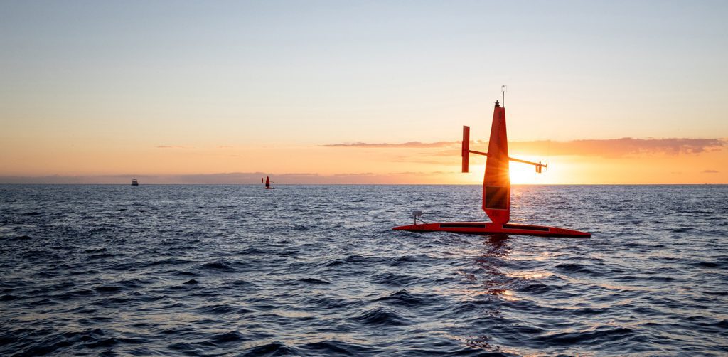 Lone Saildrone positioned in front of sun