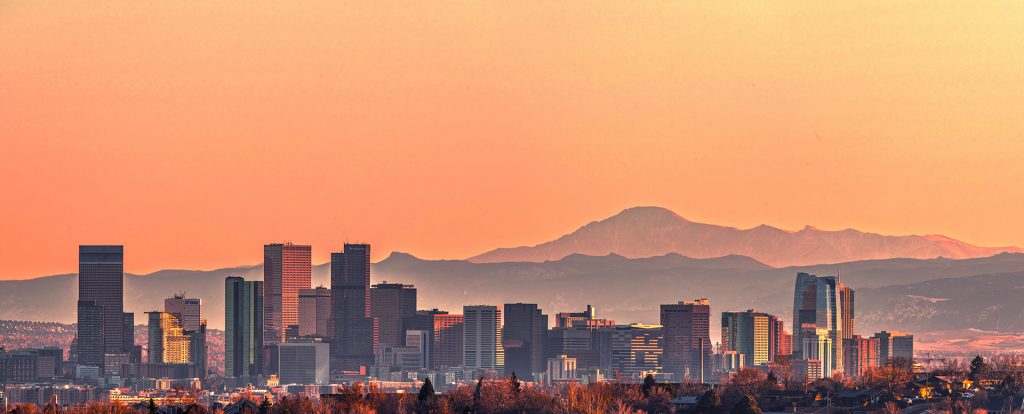 Hazy panoramic sunset image of Denver skyline