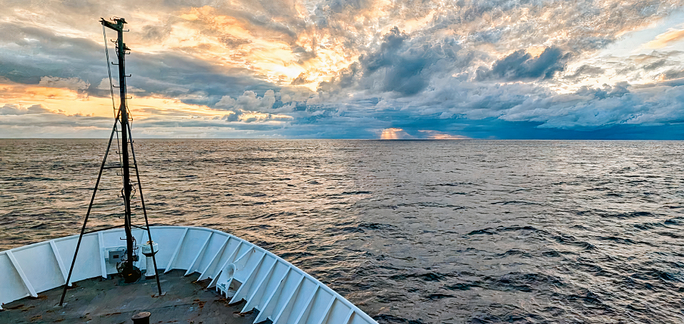 A beautiful sunrise captured from the bow of NOAA Ship Okeanos Explorer as the crew sailed through the Gulf of Alaska during the Seascape Alaska 1: Aleutians Deepwater Mapping expedition.