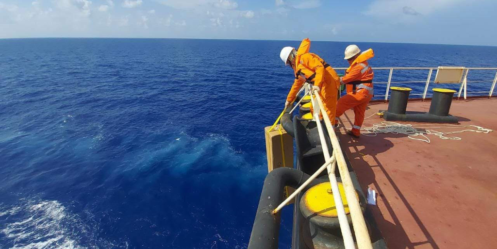 Crewmembers deploy an Argo float off the stern of the M/V Bulk Xaymacain the Caribbean Sea. The newly deployed floats are highlighted and will help fill a previous gap in coverage of the Yucatan Basin. Photo credit: Chief Officer Vyacheslav Martyanov.