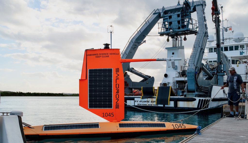 Saildrone 1045 sits alongside a dock in Bermuda after completing a research mission into the eye of Hurricane Sam in 2021.