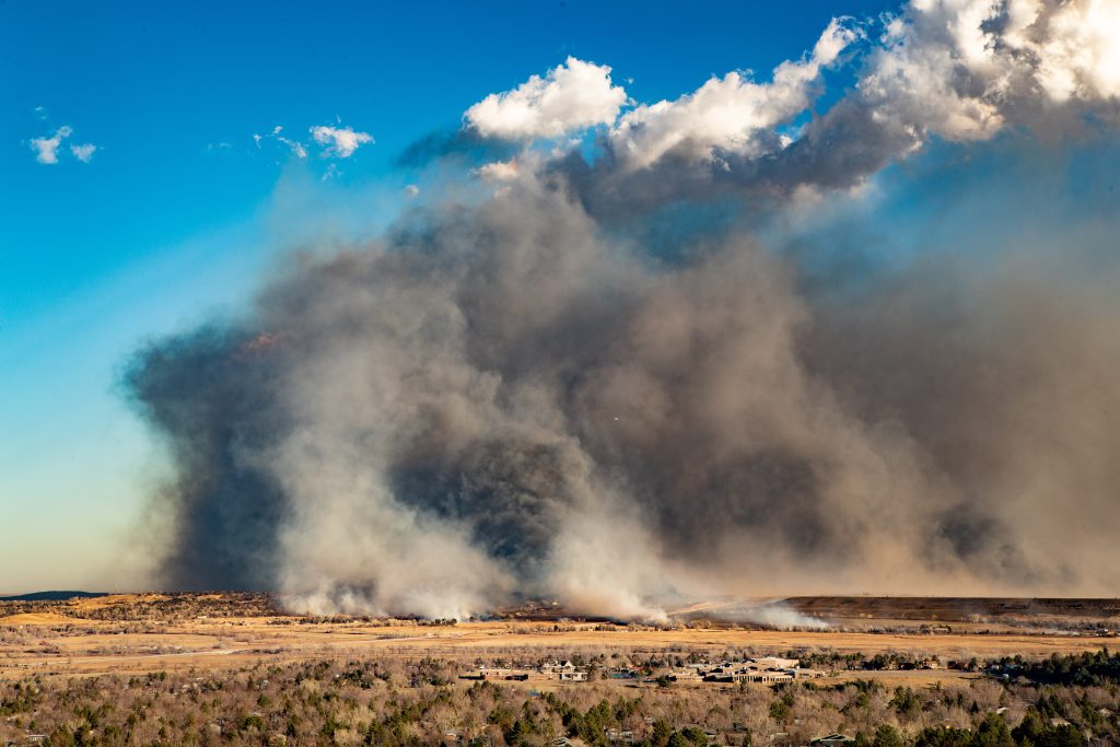 A view of the Marshall Fire from south Boulder on December 30, 2021, as it swept toward the towns of Louisville and Superior. Credit: Patrick Cullis, NOAA